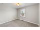 Neutral bedroom with a window providing natural light at 6200 Bow Meadows Dr, Elizabeth, CO 80107