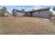 Charming single-Gathering home features a covered porch, tidy landscaping, and detached garage at 6200 Bow Meadows Dr, Elizabeth, CO 80107