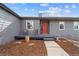 Charming front porch of single-Gathering home with cozy seating and attractive landscaping at 6200 Bow Meadows Dr, Elizabeth, CO 80107