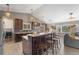 Beautiful kitchen with stainless steel appliances, granite countertops, and dark wood cabinetry at 6200 Bow Meadows Dr, Elizabeth, CO 80107