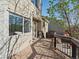 Spacious wooden deck along the rear of the home, featuring railings and outdoor access at 5115 S Valdai St, Aurora, CO 80015