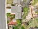 An aerial shot of a yard with a fire pit, deck, and patio at 705 Prairie Ridge Rd, Highlands Ranch, CO 80126