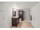Bathroom with stand up shower, sink, and storage at 705 Prairie Ridge Rd, Highlands Ranch, CO 80126
