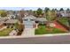 Beautiful two story home featuring a well manicured front yard and attached garage at 705 Prairie Ridge Rd, Highlands Ranch, CO 80126