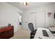 Functional office space with a sliding-door closet and view to another room at 705 Prairie Ridge Rd, Highlands Ranch, CO 80126