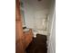 Cozy bathroom featuring wood vanity, granite top, and shower-tub combination at 7811 St Vrain Dr # 68, Frederick, CO 80530
