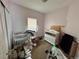 Bedroom with crib, changing table, and window providing natural light at 7811 St Vrain Dr # 68, Frederick, CO 80530