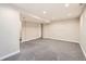 Spacious basement area with neutral carpet and recessed lighting, perfect for customization at 9661 Autumnwood Pl, Highlands Ranch, CO 80129
