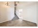 Open foyer boasts high ceilings, tile floors, and a staircase leading upstairs at 9661 Autumnwood Pl, Highlands Ranch, CO 80129