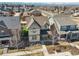 Aerial view of a charming home in a neighborhood with manicured lawns and mature trees at 540 E Fremont Pl, Centennial, CO 80122