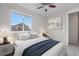 Stylishly decorated bedroom with a large window and modern decor at 540 E Fremont Pl, Centennial, CO 80122