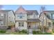 Charming two-story home with a welcoming front porch and a well-maintained lawn at 540 E Fremont Pl, Centennial, CO 80122