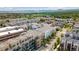 Aerial view featuring the property, nearby community, and distant mountain backdrop at 7240 W Custer Ave # 303, Lakewood, CO 80226