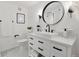 Bathroom featuring a modern vanity with drawers, a round mirror, and tile floors at 7240 W Custer Ave # 303, Lakewood, CO 80226