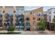 Close exterior view of The Lofts building showcasing brick facade and entryway at 7240 W Custer Ave # 303, Lakewood, CO 80226