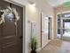 Hallway featuring residential access, nearby elevators and a view to the outside at 7240 W Custer Ave # 303, Lakewood, CO 80226
