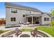 A large backyard with a cozy fire pit, seating area, and plunge pool is great for entertaining and relaxation at 14423 Shasta Daisy Ln, Parker, CO 80134