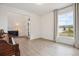 Bright entryway showcasing hardwood floors, coat rack, and grand piano at 14423 Shasta Daisy Ln, Parker, CO 80134