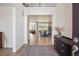 Inviting home foyer boasting an open layout with views of the dining room at 14423 Shasta Daisy Ln, Parker, CO 80134
