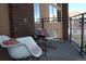 Relax on this balcony with seating and enjoy the fresh air and neighborhood views at 1925 W 32Nd Ave # 404, Denver, CO 80211
