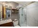 Stylish bathroom features a glass shower, modern vanity, and contemporary finishes at 1925 W 32Nd Ave # 404, Denver, CO 80211