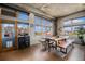 Bright dining area filled with natural light and featuring hardwood flooring at 1925 W 32Nd Ave # 404, Denver, CO 80211