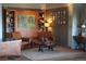 Inviting living area features hardwood floors, exposed concrete and custom built-ins at 1925 W 32Nd Ave # 404, Denver, CO 80211