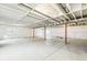 Unfinished basement with support beams, concrete floor, and plastic-covered walls at 4323 Soapberry Pl, Castle Rock, CO 80108