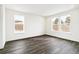 Bright bedroom with hardwood floors, recessed lighting, and large windows offering ample natural light at 4323 Soapberry Pl, Castle Rock, CO 80108
