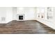 Spacious living room boasting a modern fireplace and abundant natural light at 4323 Soapberry Pl, Castle Rock, CO 80108