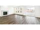 Spacious living room boasting a modern fireplace and abundant natural light at 4323 Soapberry Pl, Castle Rock, CO 80108