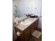 Functional bathroom with a single sink vanity and a bright mirror, ensuring a tidy and practical space at 2848 Merry Rest Way, Castle Rock, CO 80109