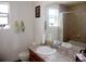 Bathroom featuring a vanity with sink, toilet, and a shower/tub combination with floral shower curtain at 2848 Merry Rest Way, Castle Rock, CO 80109