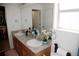 Bathroom features double sinks and vanity, enhanced by natural light at 2848 Merry Rest Way, Castle Rock, CO 80109