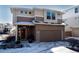 Charming two-story home featuring an attached garage and a welcoming front entrance at 2848 Merry Rest Way, Castle Rock, CO 80109