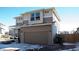 Two-story home boasts attached garage, modern design, and well-kept landscaping at 2848 Merry Rest Way, Castle Rock, CO 80109