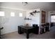 Home office with modern desk, shelving, and decorative musical notes on the wall at 2848 Merry Rest Way, Castle Rock, CO 80109