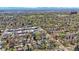 Expansive aerial view showcasing the neighborhood's layout, greenery, and distant mountain views at 1027 S University Blvd, Denver, CO 80209