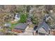 An aerial view of a charming neighborhood with mature trees and well-maintained homes at 1027 S University Blvd, Denver, CO 80209