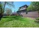 A beautifully maintained backyard with a lush lawn, offering an ideal outdoor living space at 1027 S University Blvd, Denver, CO 80209