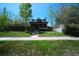 Charming home with a well-manicured lawn and inviting curb appeal at 1027 S University Blvd, Denver, CO 80209