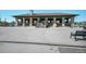 View of a pavilion near a body of water and concrete area for walking and relaxing at 1027 S University Blvd, Denver, CO 80209