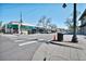 Commercial district with businesses shops, street, crosswalks, and lamp posts, offering a vibrant location at 1027 S University Blvd, Denver, CO 80209