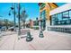Commercial retail shops, and street, with benches and landscaping for outdoor viewing at 1027 S University Blvd, Denver, CO 80209