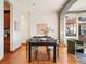 Elegant dining room featuring a stylish table, chairs, and hardwood floors at 3249 W Fairview Pl # 106, Denver, CO 80211