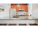Modern kitchen with stainless steel appliances, a granite countertop, and plenty of cabinet space at 3249 W Fairview Pl # 106, Denver, CO 80211