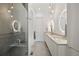 Spa-like bathroom with double vanity and a large shower at 5191 Copper Blush Ct, Castle Rock, CO 80108