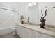 Bathroom with tub, shower, and modern vanity at 5191 Copper Blush Ct, Castle Rock, CO 80108