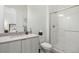 Modern bathroom with a walk-in shower and vanity at 5191 Copper Blush Ct, Castle Rock, CO 80108