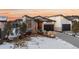 Modern two-story home with attached two-car garage and landscaped front yard at 5191 Copper Blush Ct, Castle Rock, CO 80108